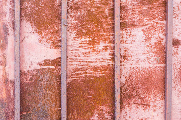 texture rusty metal with four vertical square rods, abstract background