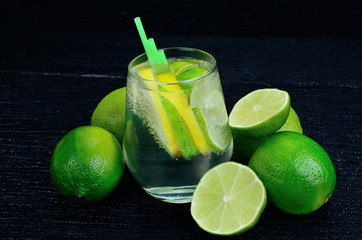 glass of water with lemon and lime
