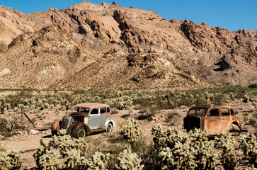 Rusty cars in desert