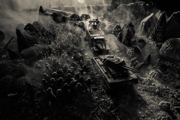 War Concept. Military silhouettes fighting scene on war fog sky background, World War Soldiers Silhouettes Below Cloudy Skyline. Armored vehicles. Tanks battle. Decoration
