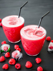 Delicious raspberry cold refreshing cocktail with berries.