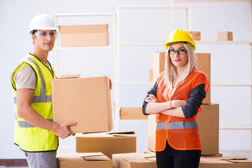 Delivery contractor delivering boxes to office