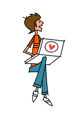 Close-up of boy holding laptop