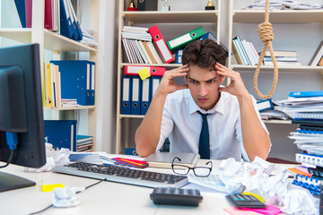 Busy frustrated businessman angry in the office