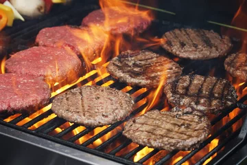 Aluminium Prints Grill / Barbecue barbecue grill cooking burger steak on the fire