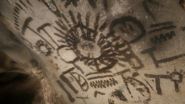 Paintings more than 7000 years old inside Magura cave slow tilt footage 