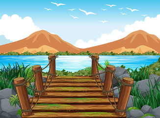 Background scene with wooden bridge to the lake