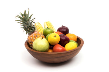 Assort fresh fruits and vegetables in basket isolated on white background