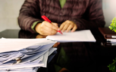 pile of document on black table
