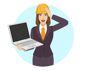 Businesswoman holding a laptop notebook and grabbed his head