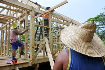Pacific island builders building a new home in Rarotonga Cook Islands