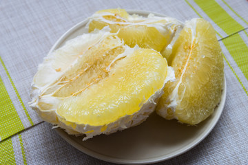 Purified pomelo lying in a plate