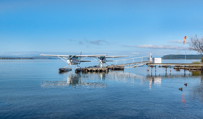 Tow seaplanes berthing on Lake Taupo, New Zealand