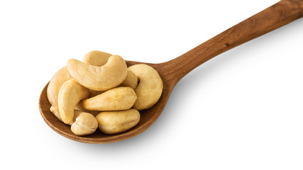 Cashew nut on wooden spoon
