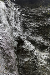 detail of wet rock texture abstract