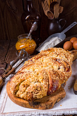 braided yeast bun  with egg and butter