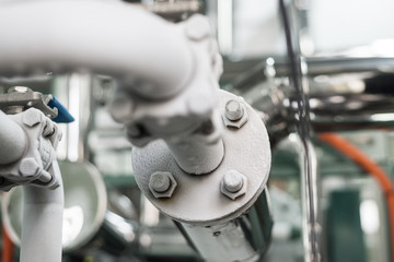 Metal pipes covered with a layer of frost.