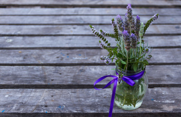 decorative border of lavender on rustic wood