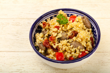 Bulgur with chicken hearts