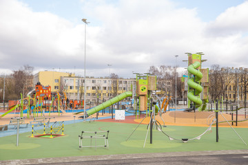 Pleyground at center, peoples and houses.