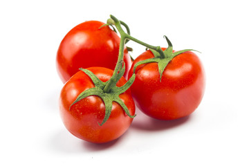 Top view of bunch of fresh tomatoes isolated on white background