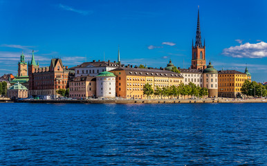 Fototapeta premium Panoramic view onto Stockholm old town Gamla Stan and Riddarholmen church in Sweden