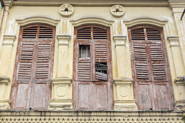 Old colonial window wooden architecture in Ipoh Malaysia South East Asia.