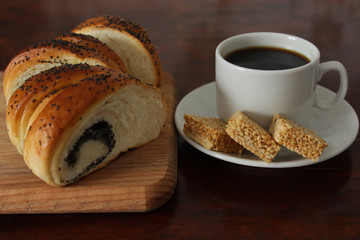 A cup of fresh coffee and sweets