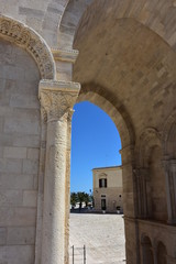 Fototapeta na wymiar Italy, Puglia, Cathedral of Trani, Arches and columns of the bell tower
