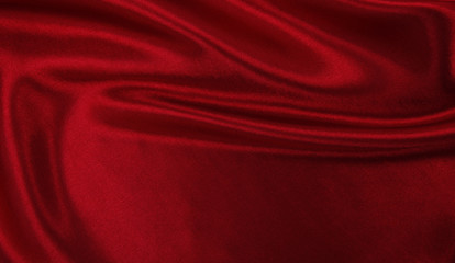 Smooth elegant red silk or satin luxury cloth texture as abstract background. Luxurious background design