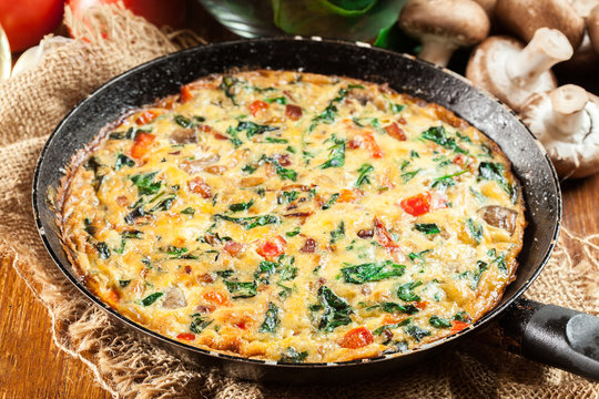 Frittata made of eggs, mushrooms and spinach