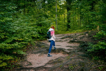 tourist girl is walking in the park. Independent travel. 