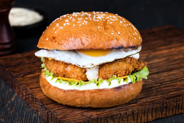Burger on a wooden board