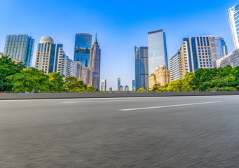 Through the empty asphalt pavement of modern cities in guangzhou, China.