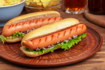 Hot dogs on wooden background