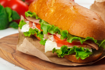 sandwich on a wooden table