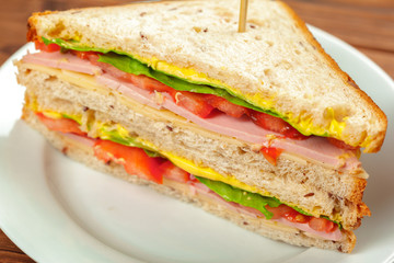 sandwich on a wooden table