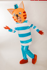 A young guy in a chic suit of a cat in sea clothes. Suit for Halloween or for playing with children