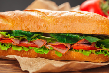 sandwich on a wooden table