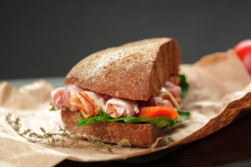 sandwich on a wooden table