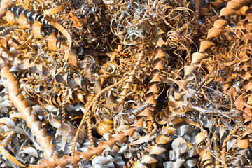 silver spirals of metal shavings as garbage, texture of different size of metal spirals shavings texture, metal shavings texture