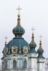 Fototapeta na wymiar Domes of the Saint Andrews Church in Kiev, Ukraine.
