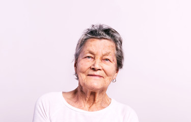 Portrait of a senior woman in studio.