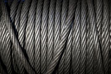 Background with a coiled steel cable.