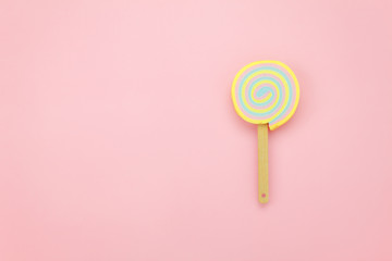 Table top view shot of arrangement food object background concept.Flat lay of sweet candy on the modern rustic pink paper at home office desk wallpaper.pastel tone creative design.