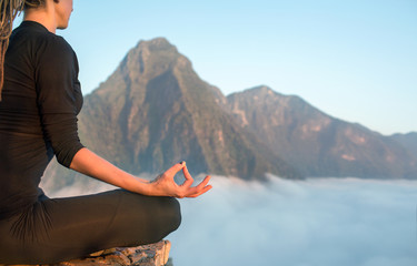 Serenity and yoga practicing,meditation at mountain range
