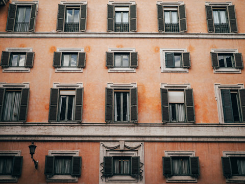Orange building with glasses