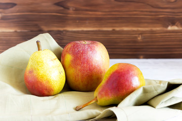 fresh pears on wooden background