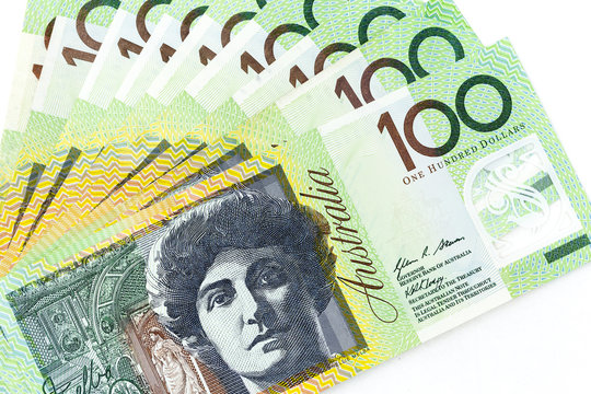 Currency banknotes spread across frame australian dollar