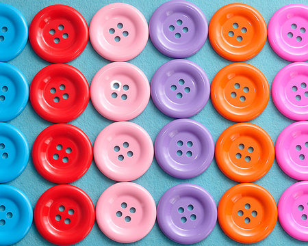 Rows of colorful buttons on a blue background